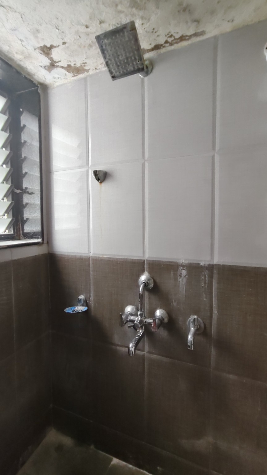 Tiled bathroom in Kothrud 2 BHK rental