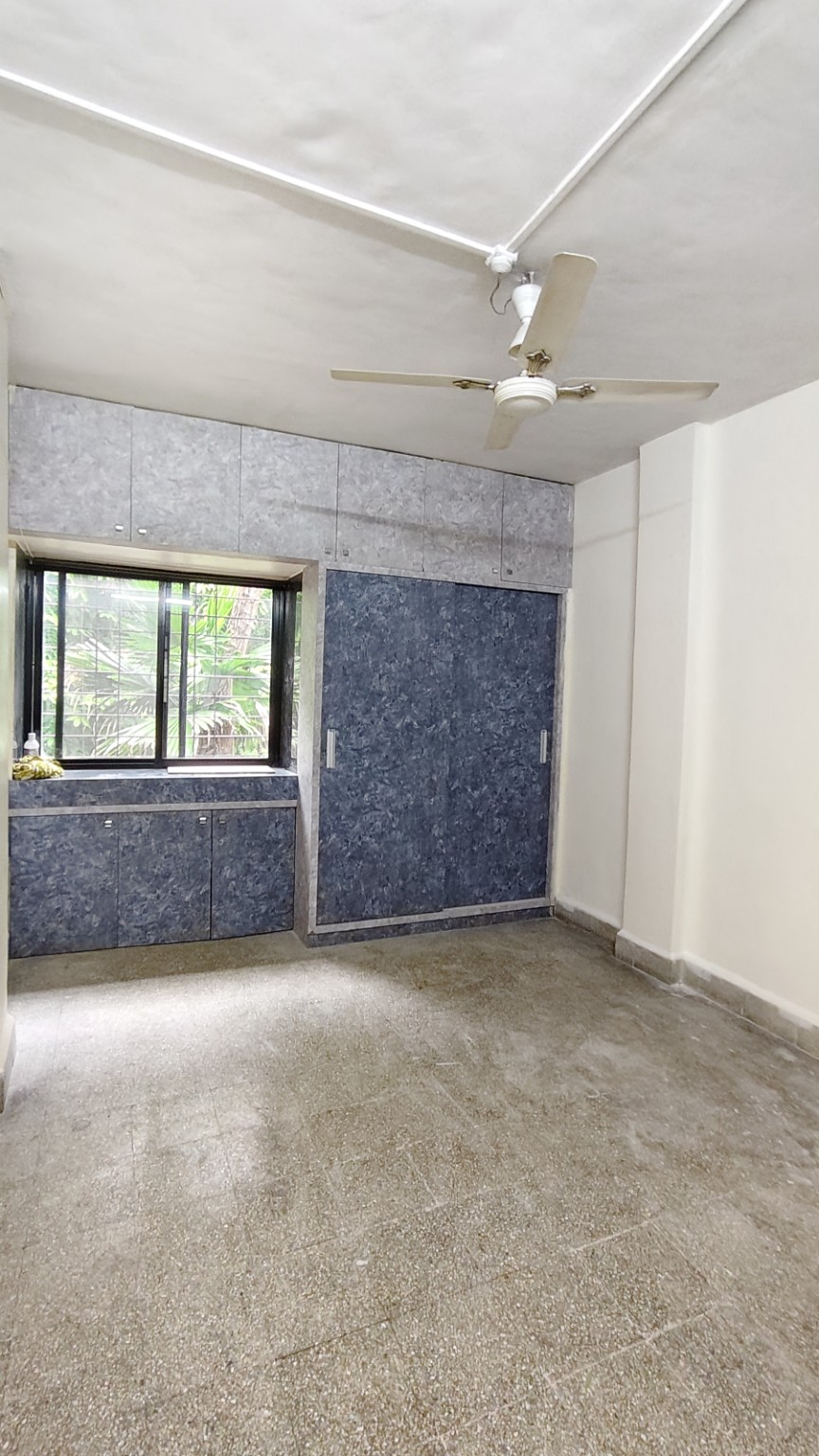 Bedroom with built in wardrobe in 2 BHK rental Kothrud